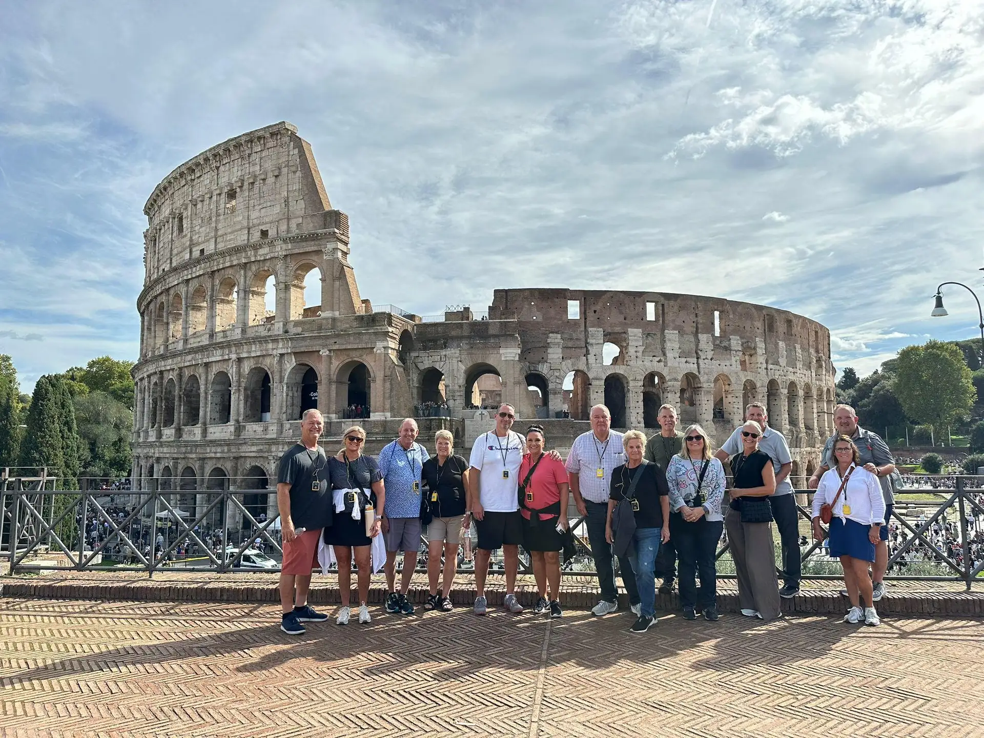 Visitors exploring the Colosseum with a local guide